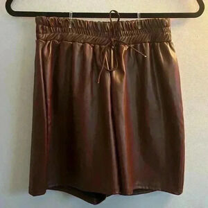 Pretty Little Thing brown faux leather shorts- new with tags- size US6